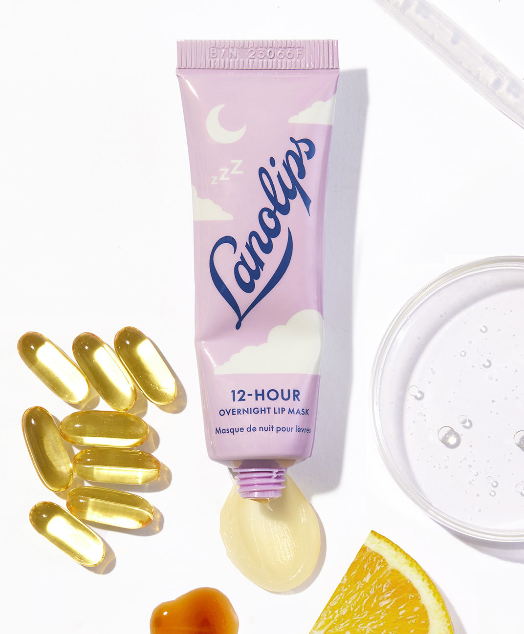 Lanolips 12 Hour Overnight Lip Mask placed on a white background, made with ultra-pure lanolin, vitamin c, hyaluronic acid and ceramides to nourish dry lips.