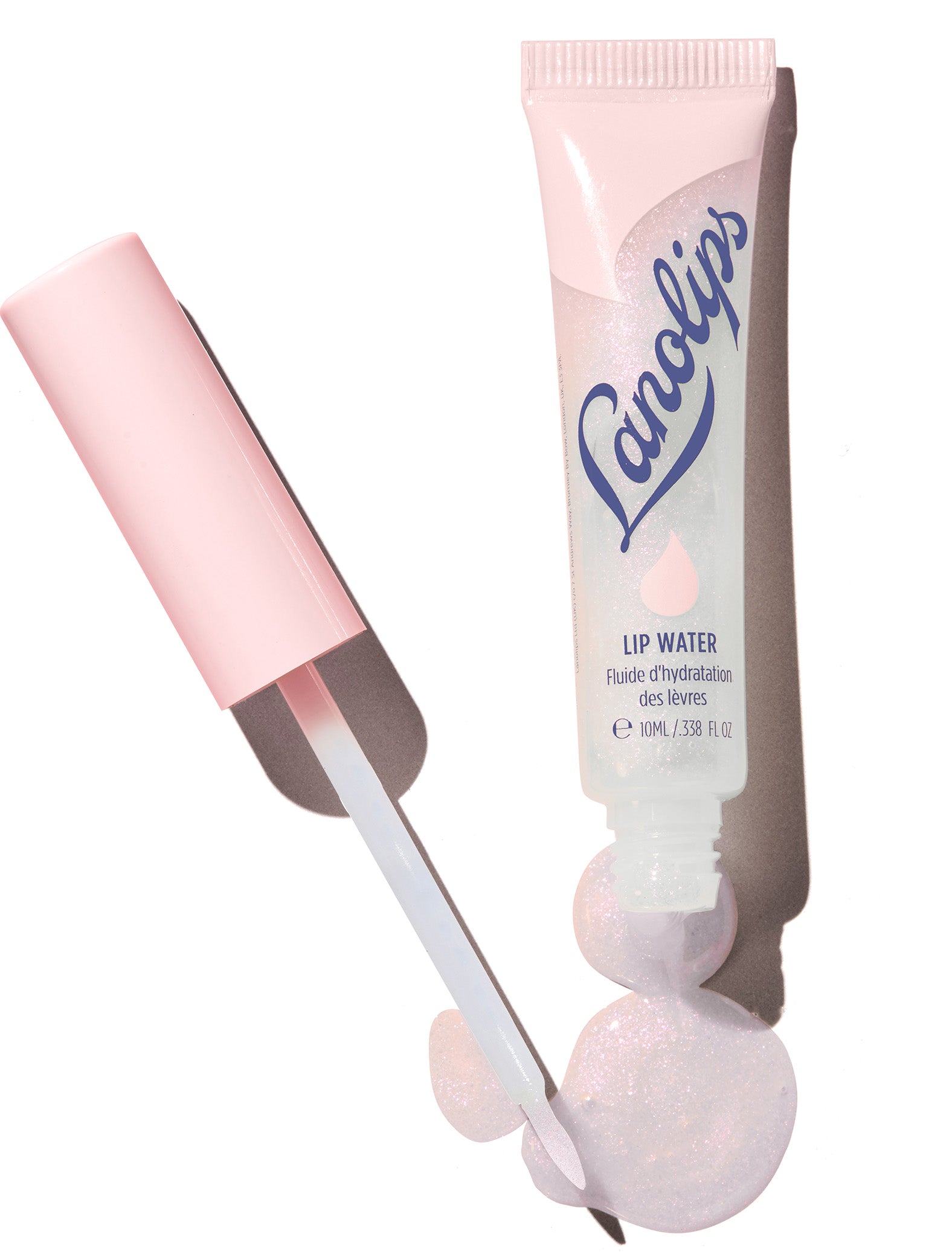 Product shot of Lanolips Liquid Lip Water Original tube open, showing the colour, finish and texture of the product.