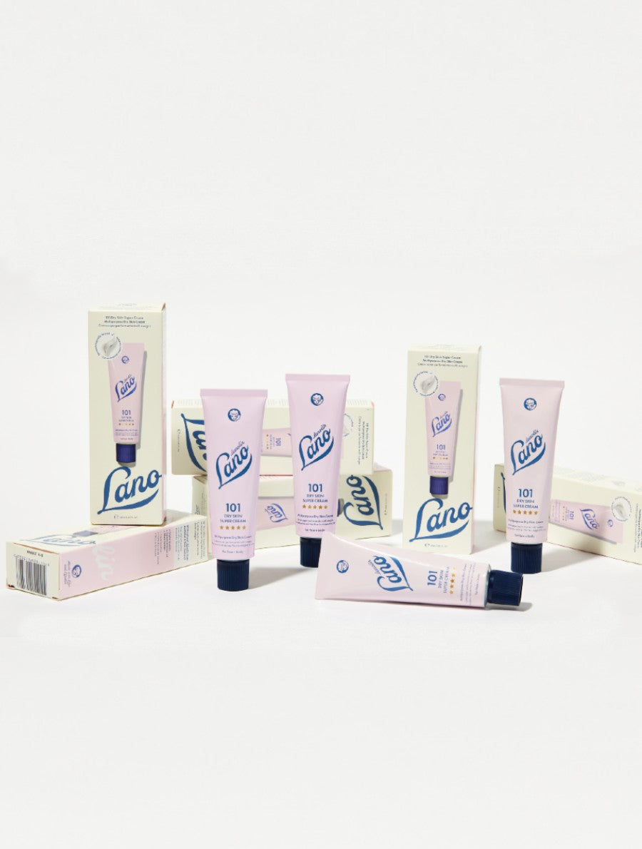 Lanolips 101 Dry Skin Super Cream tube on display. Formulated with triple lanolin for intense hydration and a rich, whipped texture. This multipurpose cream soothes and replenishes dry, rough skin on face and body.