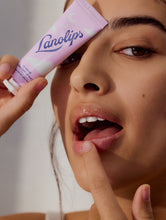 Load image into Gallery viewer, Model applying Lanolips 12 Hour Overnight Lip Mask 
