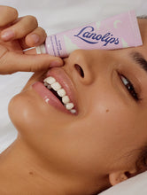 Load image into Gallery viewer, Model close-up shot of the Lanolips 12 Hour Overnight Lip Mask

