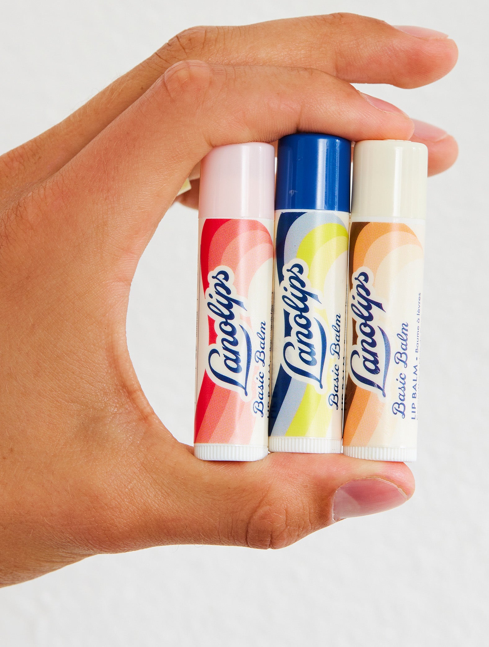 Groups of Lanolips Basic Balm range. 