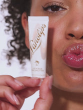 Load and play video in Gallery viewer, Video of Lanolips Lip Scrubs. Comes in two flavours: Coconutter and Strawberry.

