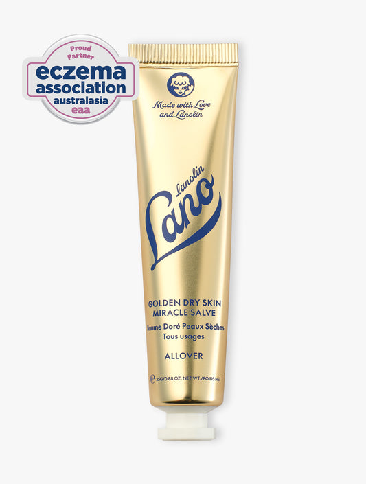 Product Shot of Lanolips Golden Dry Skin Miracle Salve 25g closed tube with a white cap. An ultra-hydrating, multi-purpose formula designed to deeply nourish and repair very dry skin, hands, and rough patches. 

The Golden Dry Skin Miracle Salve has been recognised by the Eczema Association of Australasia (EAA) for suitability on eczema-prone skin.*

*The EAA logo represents a brand partnership and product suitability assessment only and does not constitute medical endorsement. 
