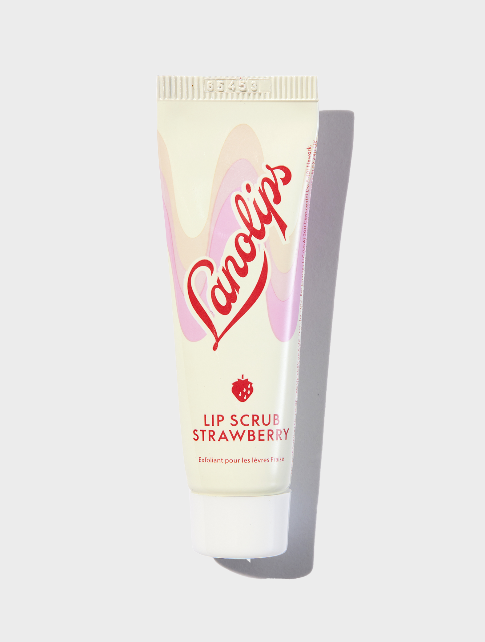 Lanolips Lip Scrub Strawberry mini contains rich-lanolin, finely milled strawberry seeds, sugar and vitamin e to gently smooth away dead skin, while the lanolin deeply hydrates.