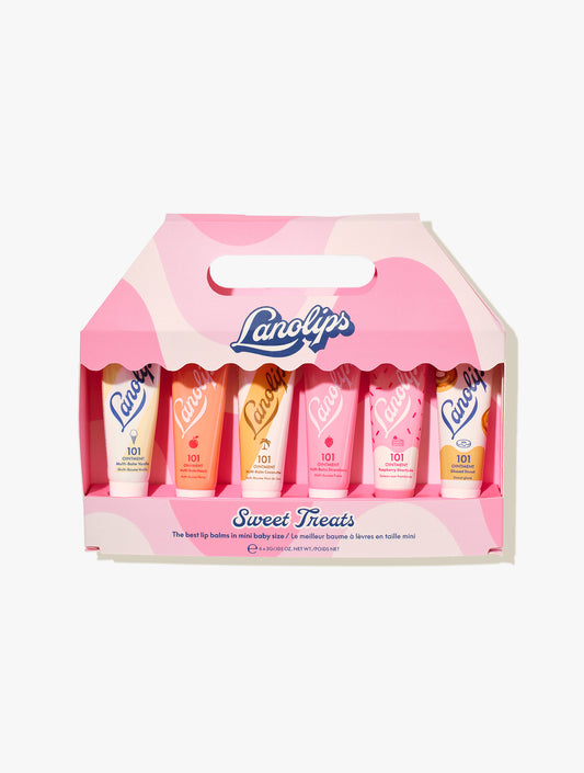 Lanolips Sweet Treats gift set – 6 pc mini 101 Ointment balms in assorted flavours, packed in a pink carry box surrounded by colourful Lanolips tubes. Comes in the sweet flavours of Vanilla, Peach, Coconutter, Strawberry, Raspberry Shortcake and Glazed Donut.