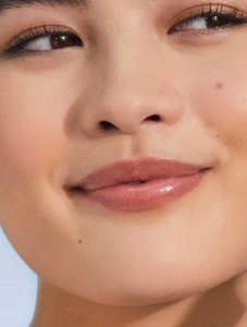 Model with Tinted Lip Balm in Perfect Nude SPF30 is anchored by the high lanolin content, drenching the lips in non-sticky hydration which lasts for hours with the perfect nude tint which suits everyone.