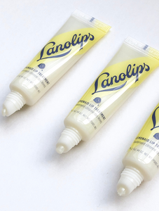 Tubes of Lemonaid Lip Treatment