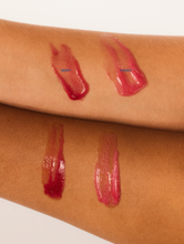 Load image into Gallery viewer, Arm swatches of Glossybalms in Berry and Candy. 
