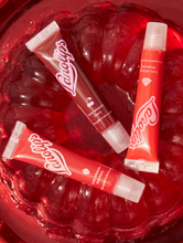 Load image into Gallery viewer, Lanolips Fruity Jellybalms are soft, bouncy and shiny. It is a tinted lip balm that works like a lip stain, but drenched in the intense Lanolips hydration you know and love. 
