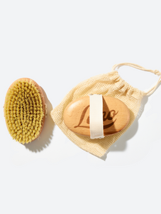 The Lanolips Dry Body Brush comes in a cotton bag
