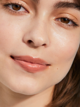 Load image into Gallery viewer, Tinted Lip Balm in Perfect Nude is a universally flattering nude tint.
